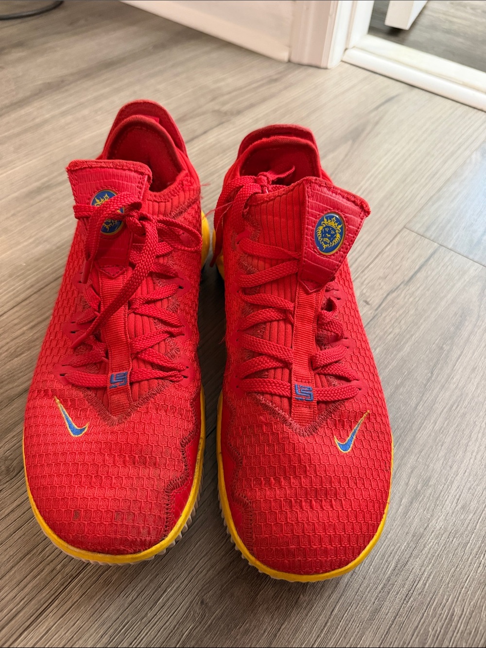 LeBron James Nike Red Low-Top Basketball Sneakers with Yellow Soles